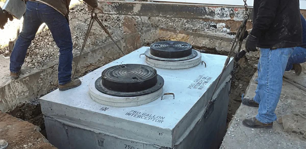Grease trap installation for a commercial property drainage system in Sioux Falls, SD