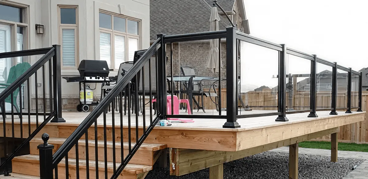 Handrail installation on a deck staircase for safety and code compliance in Sioux Falls, SD